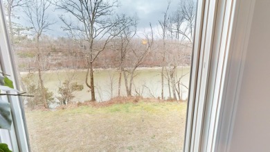 Discover the pinnacle of lakeside luxury at 97-1 Eagle Drive