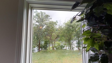 Discover the pinnacle of lakeside luxury at 97-1 Eagle Drive