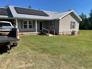 Peaceful country home on 16.2 acres, small pond and many other