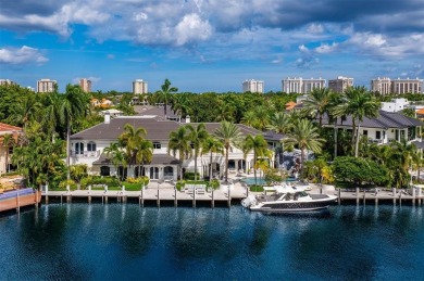 Positioned within the exclusive, guard-gated community of Bay