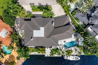 Positioned within the exclusive, guard-gated community of Bay