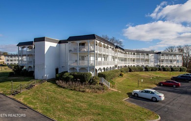 This beautifully updated 2-bedroom corner unit on the main level