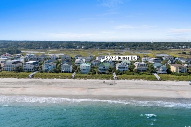 Beach-style Splendor! Welcome to 537 S Dunes Drive, an elegant