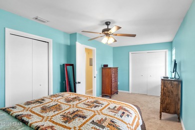 Welcome to this charming 2-bedroom, 2-bath home on a half-acre