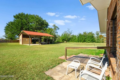 Welcome to this charming 2-bedroom, 2-bath home on a half-acre