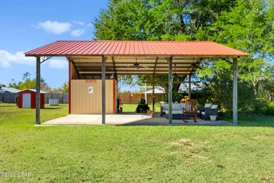 Welcome to this charming 2-bedroom, 2-bath home on a half-acre