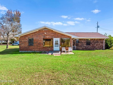 Welcome to this charming 2-bedroom, 2-bath home on a half-acre