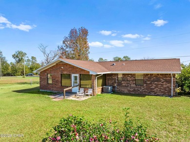 Welcome to this charming 2-bedroom, 2-bath home on a half-acre
