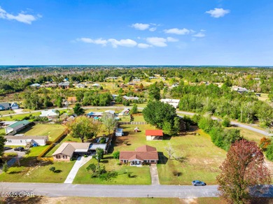 Welcome to this charming 2-bedroom, 2-bath home on a half-acre