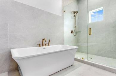 This new construction, six-bedroom, six-bathroom Gulf-front home