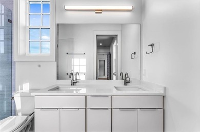 This new construction, six-bedroom, six-bathroom Gulf-front home