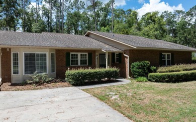 This charming 2,220 sq. ft. brick home is on one of the larger