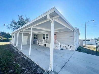 Paradise awaits you with this LIKE NEW, VERY Spacious 2 Bedroom