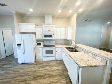 Paradise awaits you with this LIKE NEW, VERY Spacious 2 Bedroom