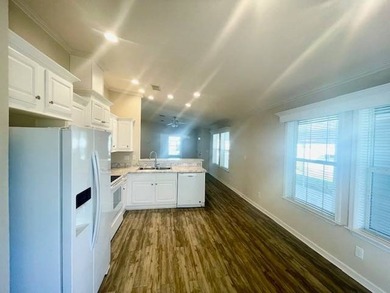 Paradise awaits you with this LIKE NEW, VERY Spacious 2 Bedroom