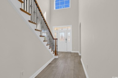 WE ARE ACCEPTING BACK-UP OFFERS.  Nestled just one row back from