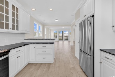 WE ARE ACCEPTING BACK-UP OFFERS.  Nestled just one row back from