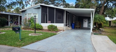 55+/2BD2BA/+ DEN/UPDATES/LAMINATE FLOORS/HANDICAP RAMP  This