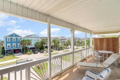 Just steps from the beach, this turn-key 2nd row home offers the