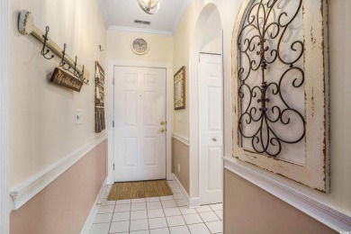 Welcome to this bright and inviting end-unit condo, perfectly