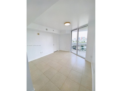 LUXURY OCEANFRONT BUILDING, GRAND LOBBY AND FIRST CLASS