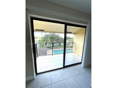 MOVE IN READY,  2BD/2BA TOP FLOOR with a peaceful Lake and