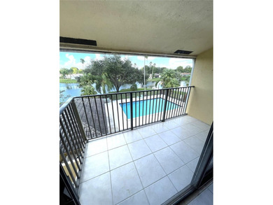 MOVE IN READY,  2BD/2BA TOP FLOOR with a peaceful Lake and