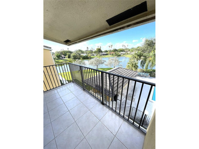 MOVE IN READY,  2BD/2BA TOP FLOOR with a peaceful Lake and