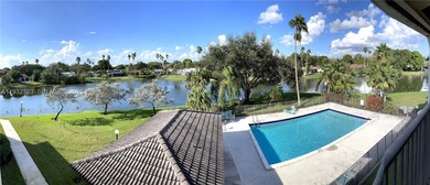 MOVE IN READY,  2BD/2BA TOP FLOOR with a peaceful Lake and