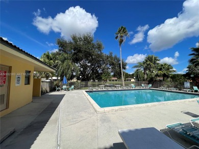 MOVE IN READY,  2BD/2BA TOP FLOOR with a peaceful Lake and