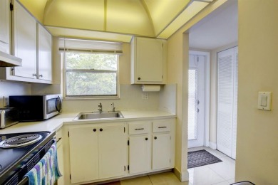 Start your mornings with coffee on the screened-in patio