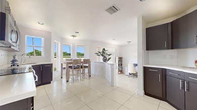 Nestled within the exclusive gated community of Three Lakes, a