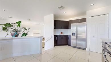 Nestled within the exclusive gated community of Three Lakes, a