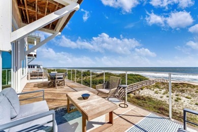 This exclusive luxury 8 BR/ 8.5 BA beachfront home is not just a