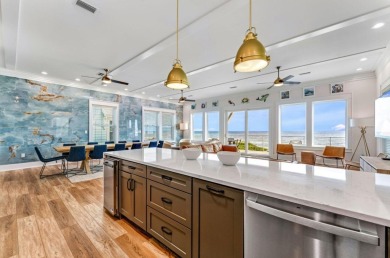 This exclusive luxury 8 BR/ 8.5 BA beachfront home is not just a