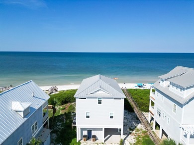 Gulf Front!  Enjoy breathtaking views from this 4 bedroom 4 1/2