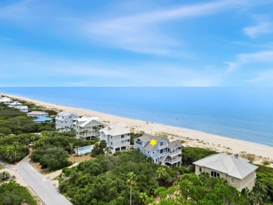 A Beautiful Towering 5 Bedroom Beachfront home located on the
