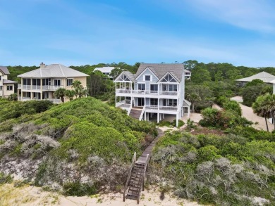 A Beautiful Towering 5 Bedroom Beachfront home located on the