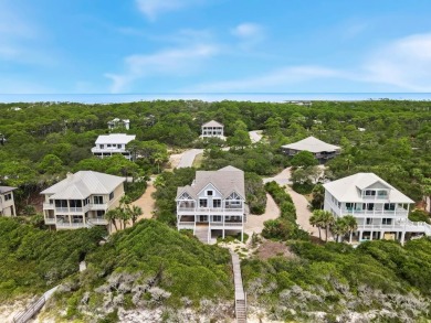 A Beautiful Towering 5 Bedroom Beachfront home located on the
