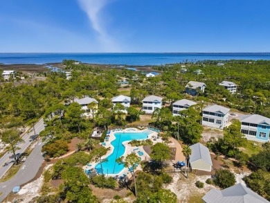A Beautiful Towering 5 Bedroom Beachfront home located on the