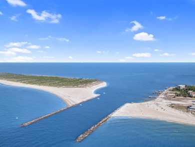 A Beautiful Towering 5 Bedroom Beachfront home located on the