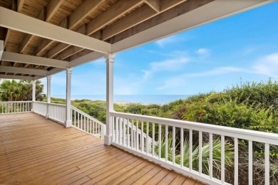 A Beautiful Towering 5 Bedroom Beachfront home located on the