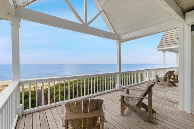 A Beautiful Towering 5 Bedroom Beachfront home located on the