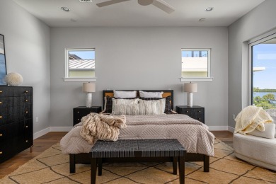 Brand New luxury construction at gated Grand Harbor! Enjoy true