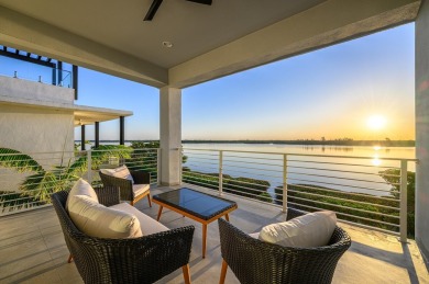 Brand New luxury construction at gated Grand Harbor! Enjoy true