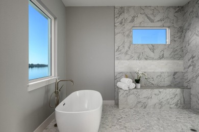 Brand New luxury construction at gated Grand Harbor! Enjoy true