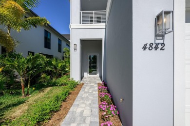 Brand New luxury construction at gated Grand Harbor! Enjoy true