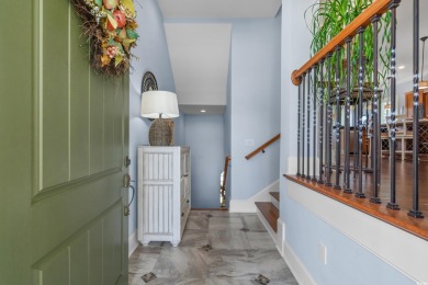 Discover coastal elegance in this exceptional home nestled along