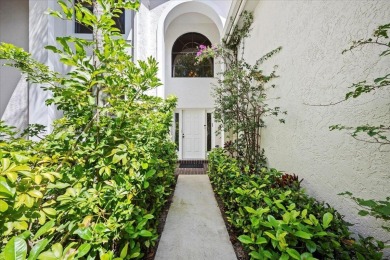 Experience tranquil waterfront living with elevated views in the