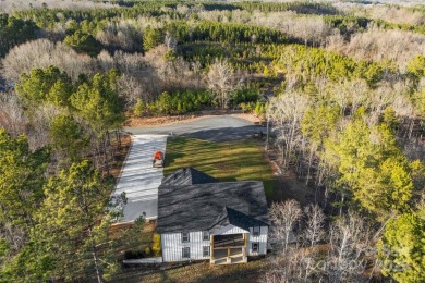 Nestled on 2.24 acres, this exceptional custom-built home offers